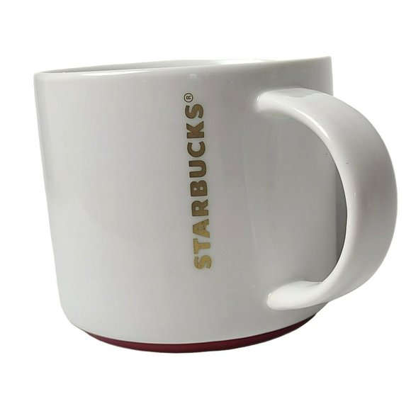 Starbucks Other - Starbucks 2012 White Christmas Holiday Gold Letters 16 oz Coffee Mug / Tea Cup